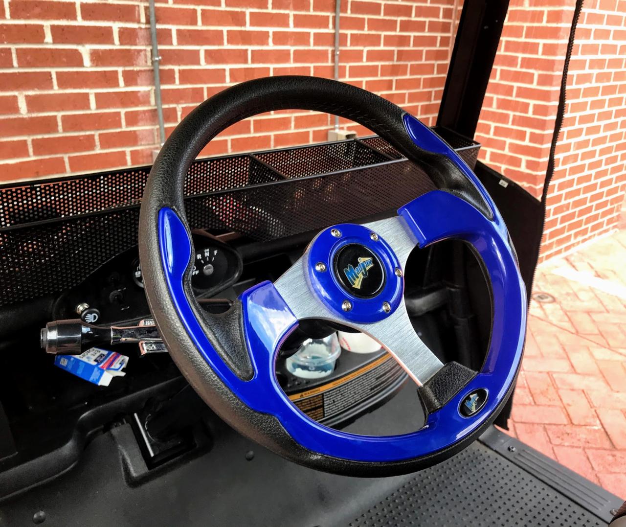 Golf cart steering wheels