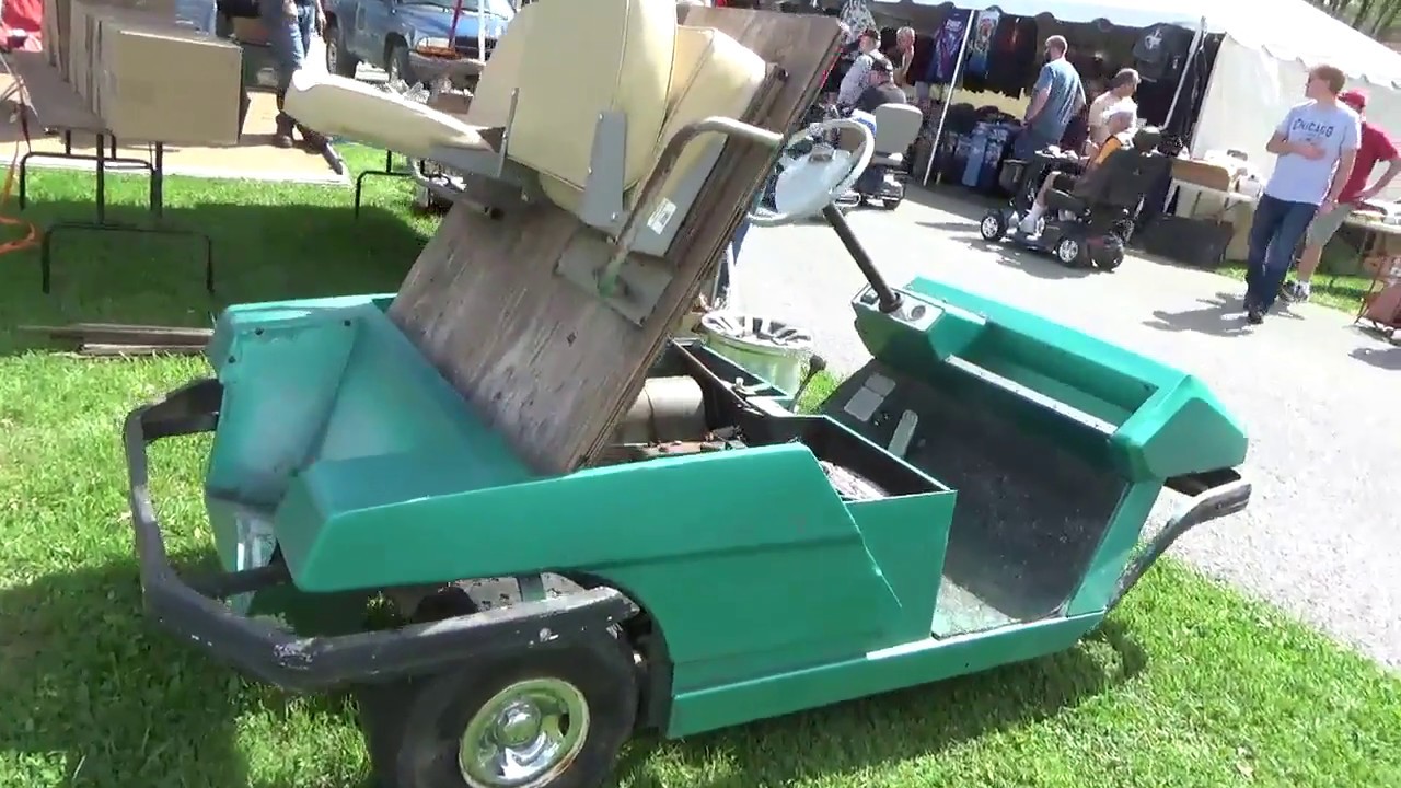 Antique cushman golf cart