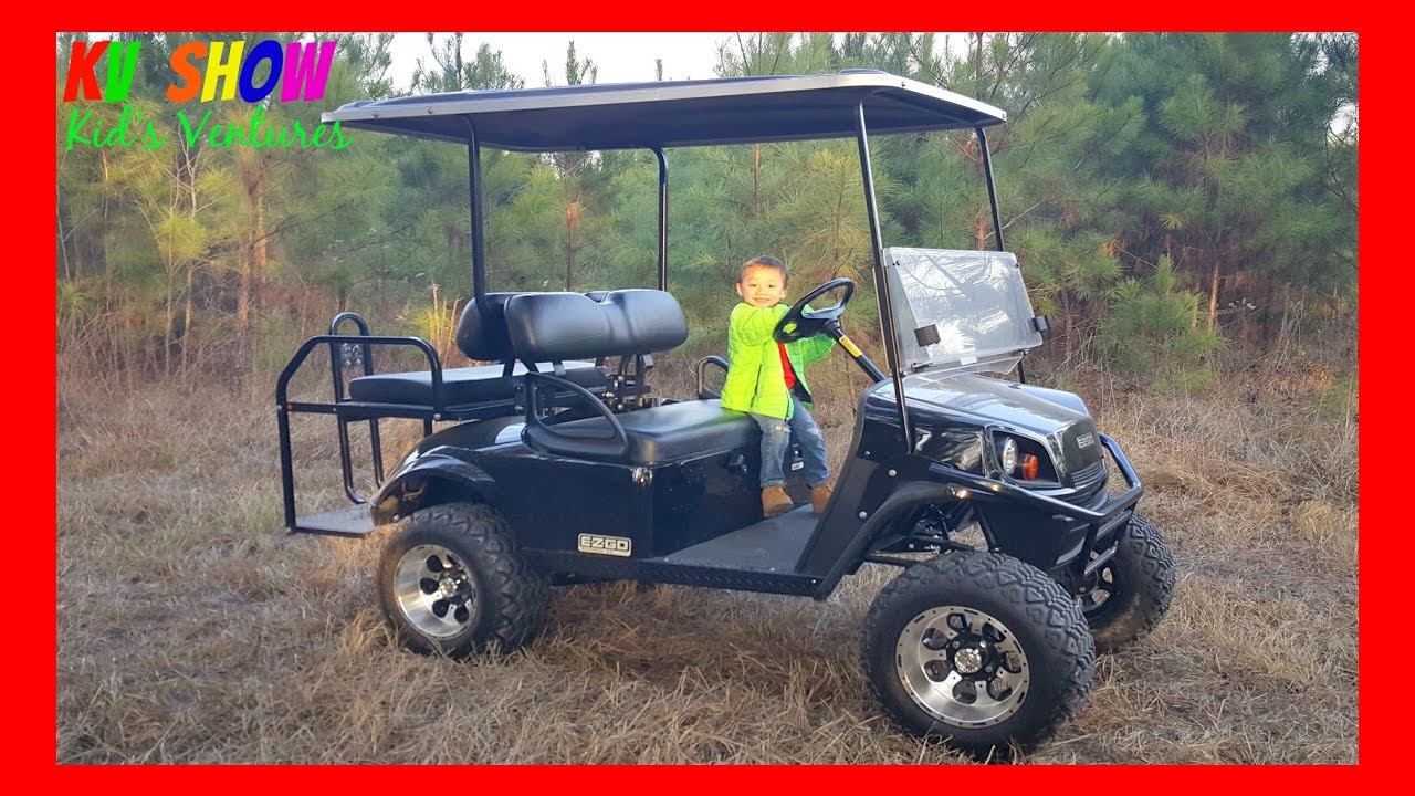 Golf cart kids driving kid gas powered old year fun